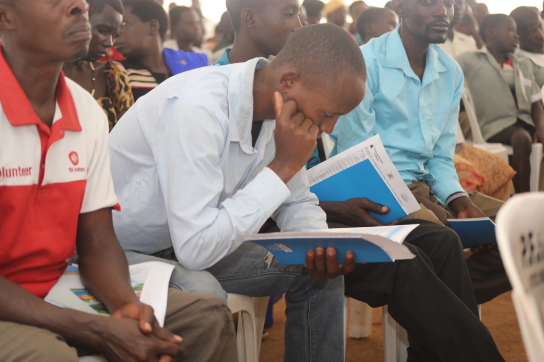 one of the residents reading through ESIA report