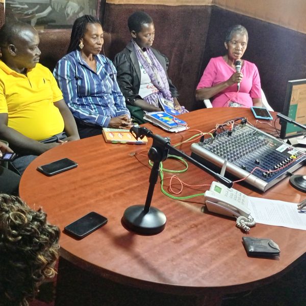 Community members in studios of Community Green Radio during a talk show recently.