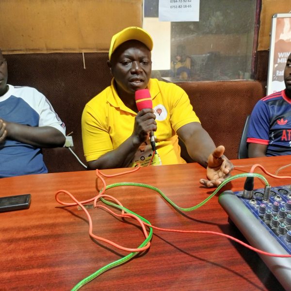 Mr. Ssembatya in the studios of Community Green radio