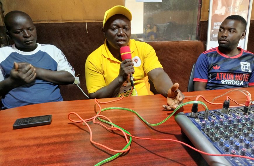 Mr. Ssembatya in the studios of Community Green radio