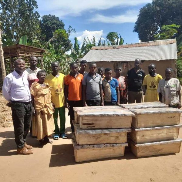 Resident of Lwengoma with NAPE Officer in charge of Forests and Biodiversity David Kureba