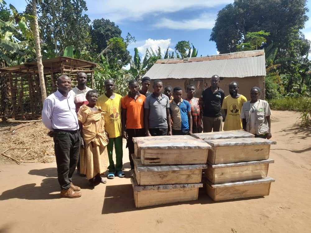 Resident of Lwengoma with NAPE Officer in charge of Forests and Biodiversity David Kureba